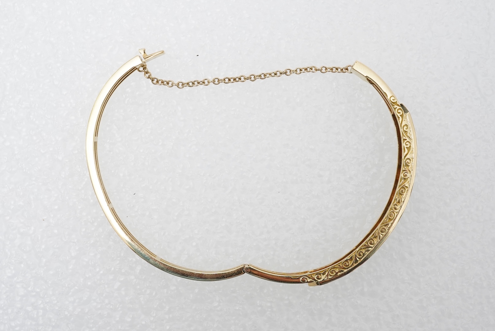 A sapphire and diamond bangle